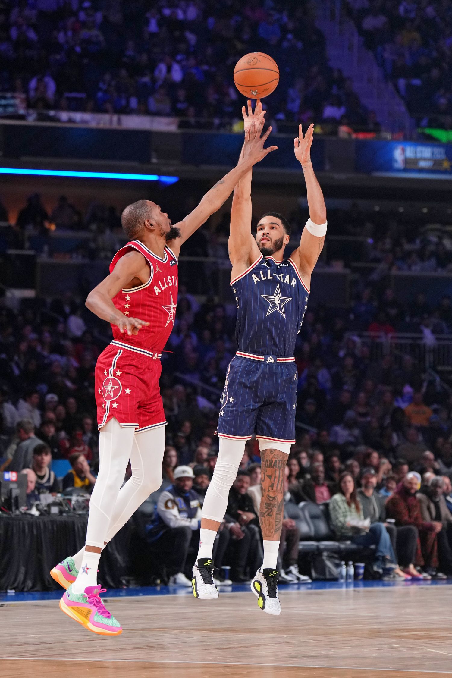 Jayson Tatum shoots over Kevin Durant in the 2024 NBA All-Star Game.